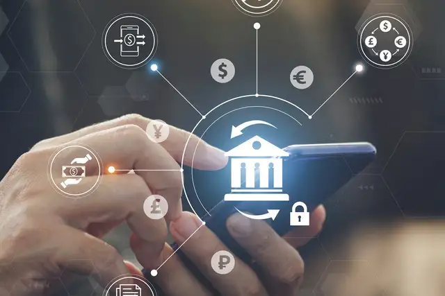 A hand holding a phone